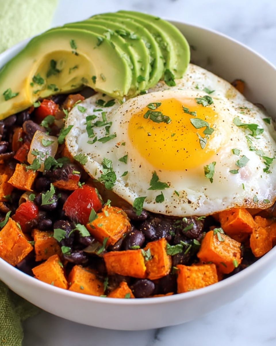 Southwest Sweet Potato Hash with Eggs, Black Beans, and Avocado Recipe - Recipe Image