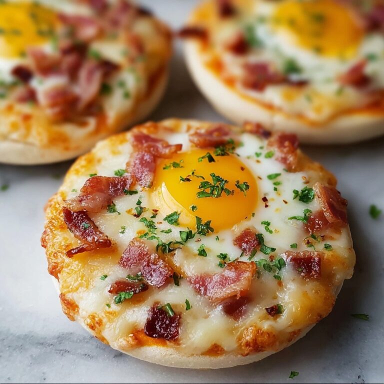 English Muffin Breakfast Pizza with Sausage, Eggs, and Cheddar Recipe
