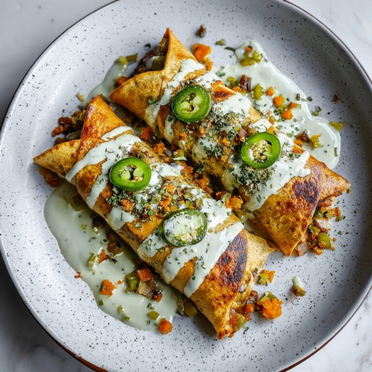 Cheesy Pumpkin Taquitos with Roasted Jalapeño Pepita Crema Recipe